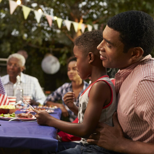 black-father-and-son-at-family-4th-july-barbecue
